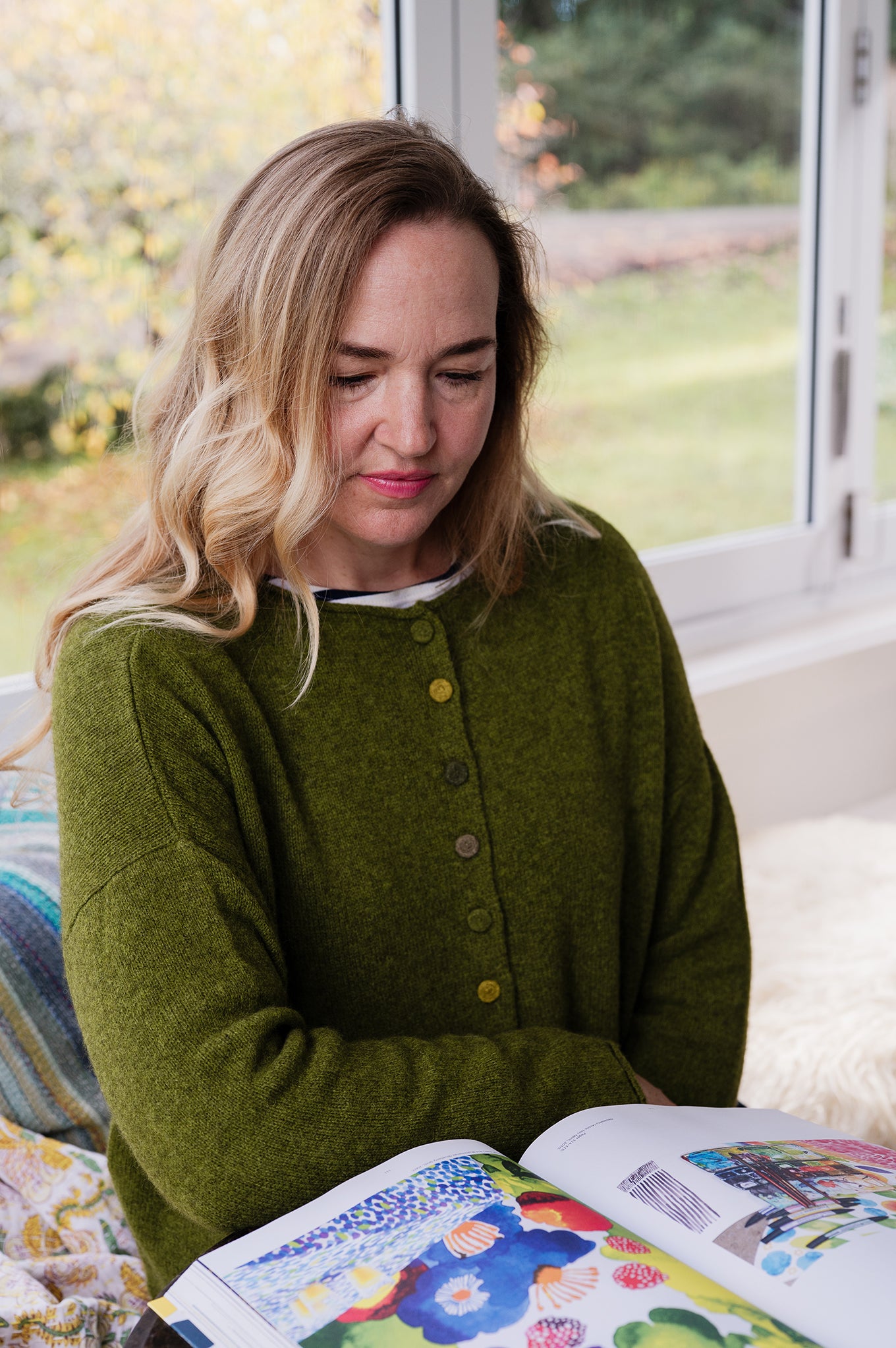 Baby yak one size reversible cardigan sweater with hand embroidered buttons in chartreuse green.