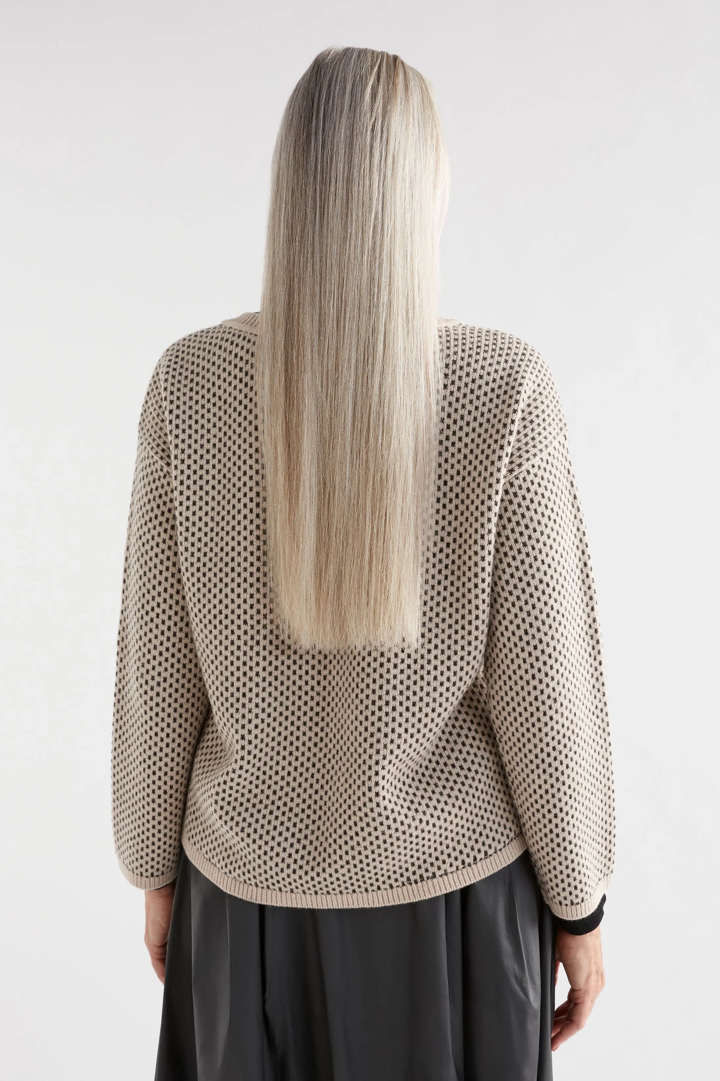 Elk the Label Bis sweater in merino and recycled nylon, dot stitch fawn and loden green.