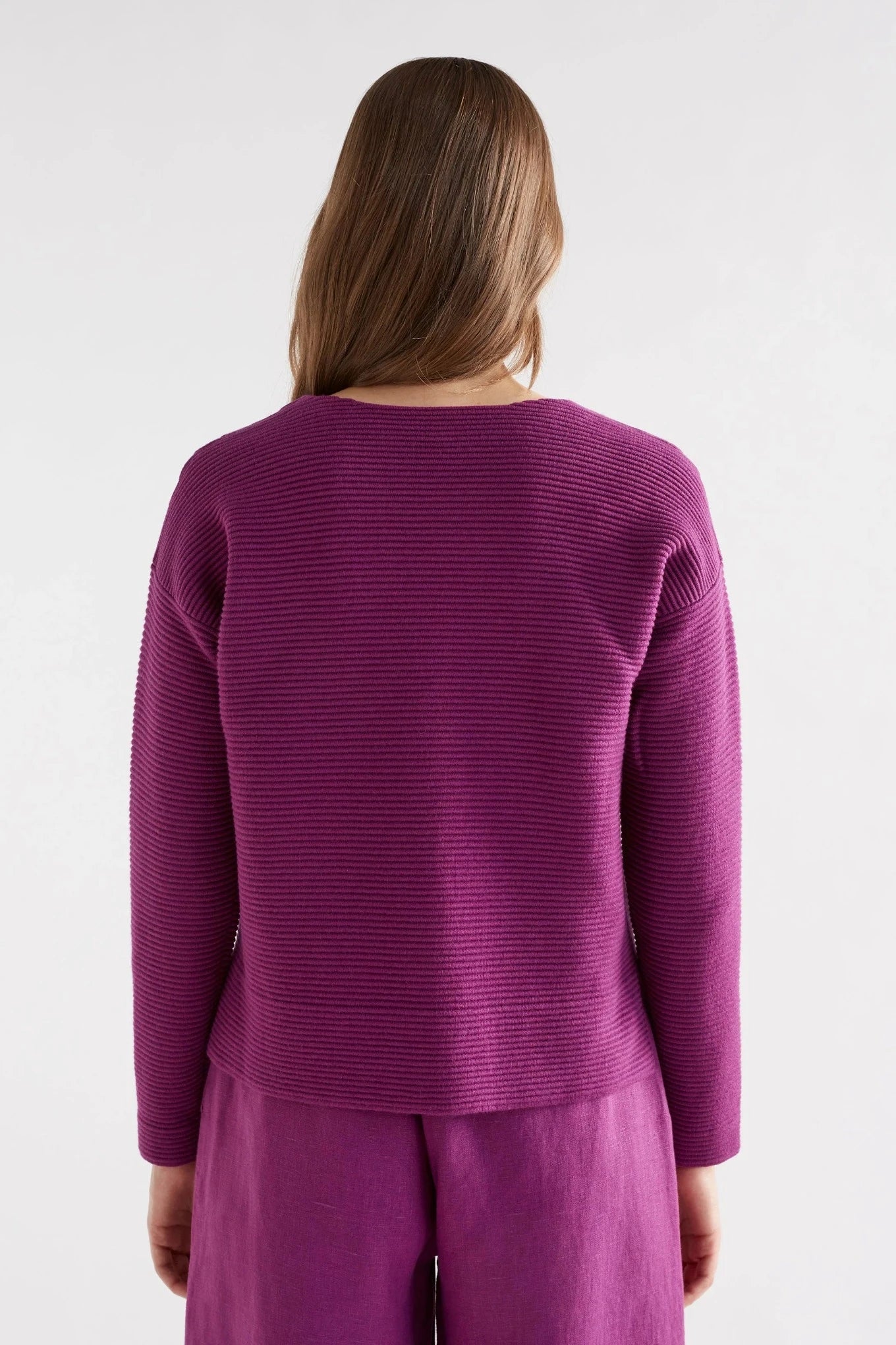 Elk the Label Neui ottoman knit cotton merino sweater in magenta pink.