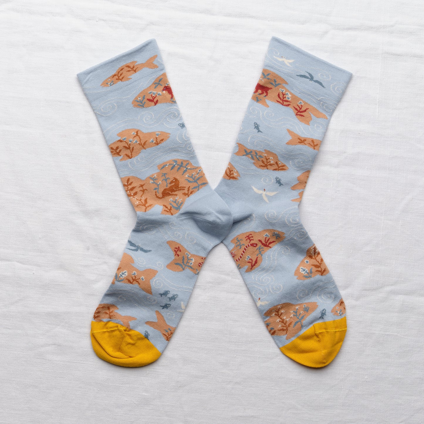 Bonne Maison cotton socks sky blue with tiny floating islands.