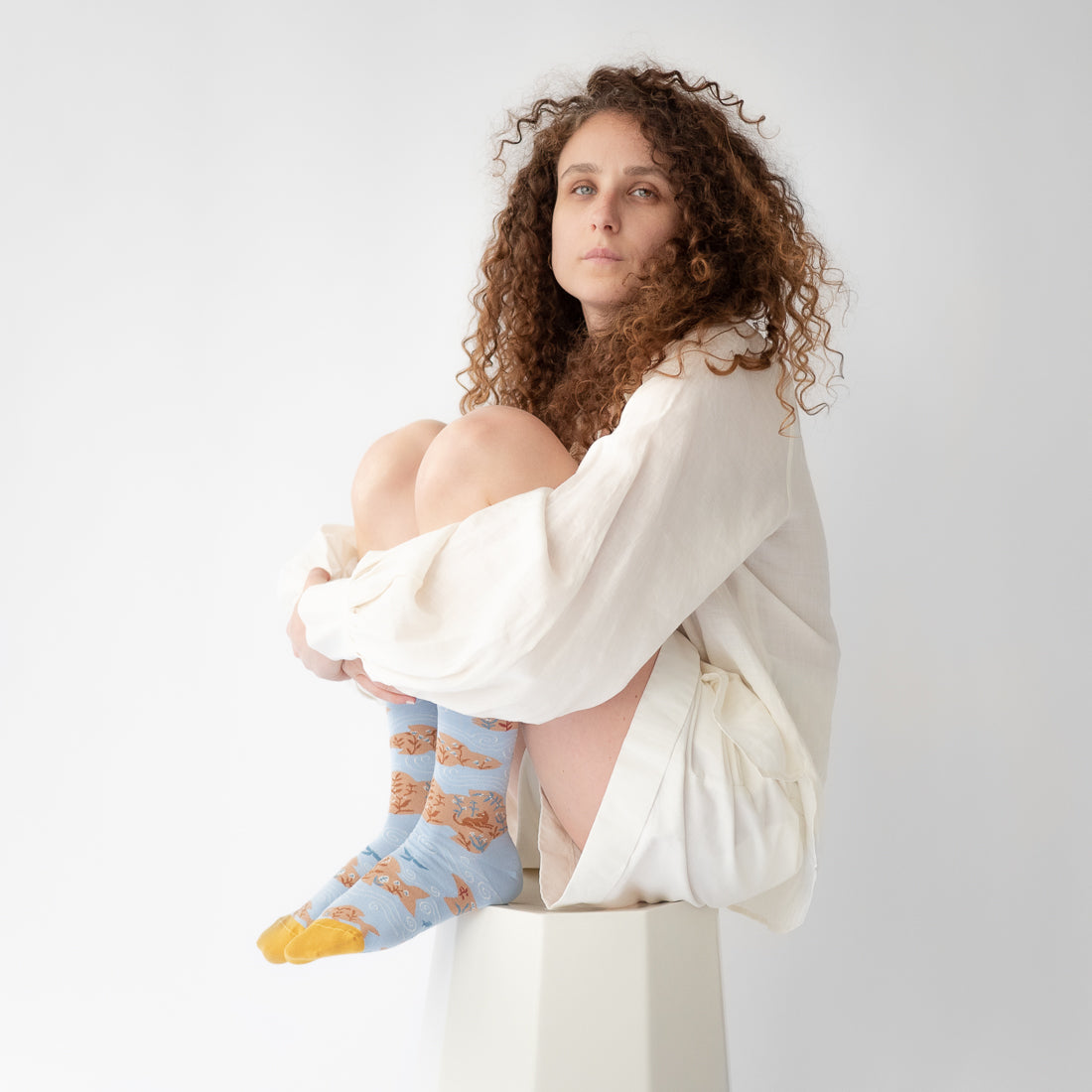 Bonne Maison cotton socks sky blue with tiny floating islands.