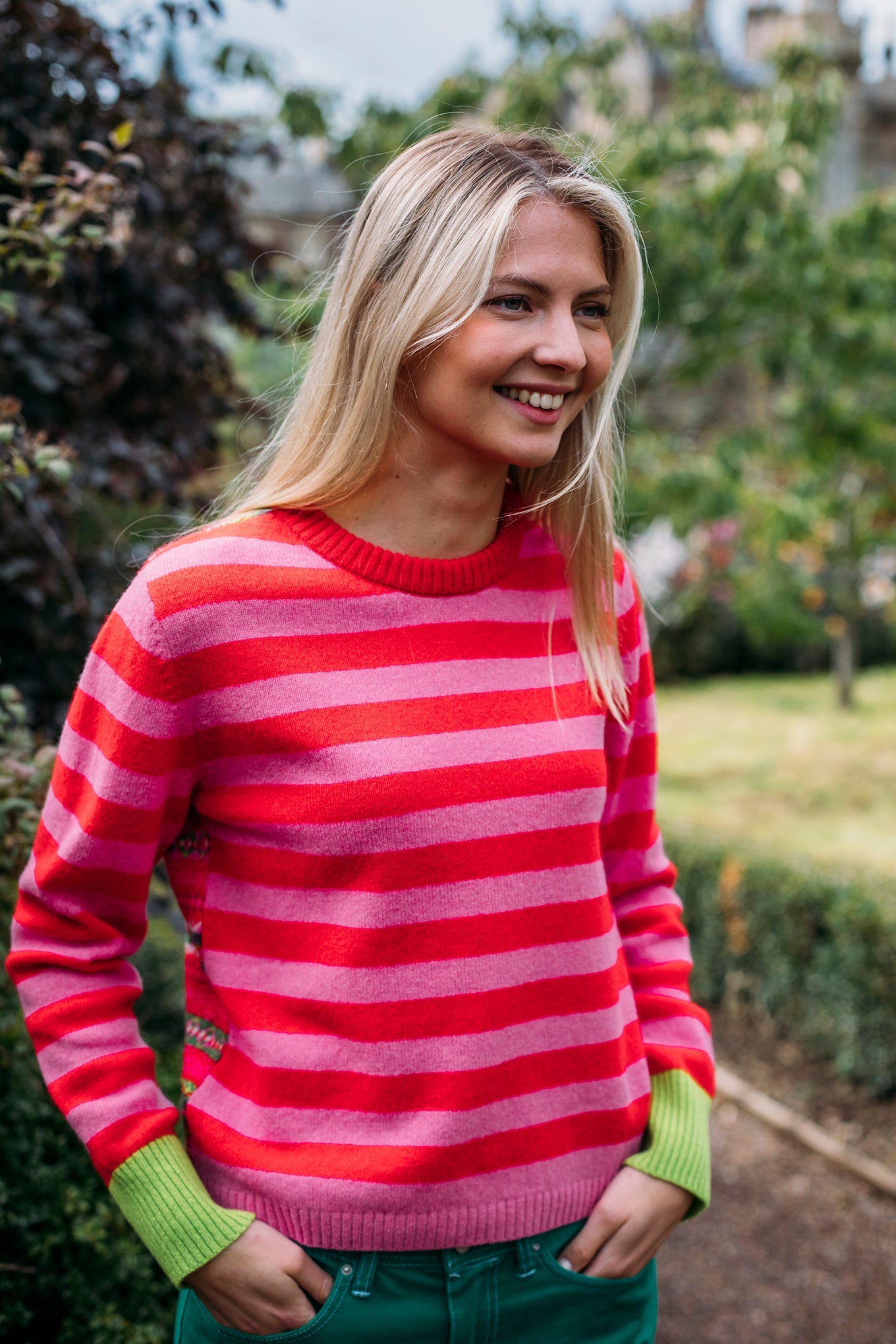Eribe Stobo reversible fairisle and stripe sweater in soft lambswool, Rosa in pink and re with highlights of orange, lime and leaf green.