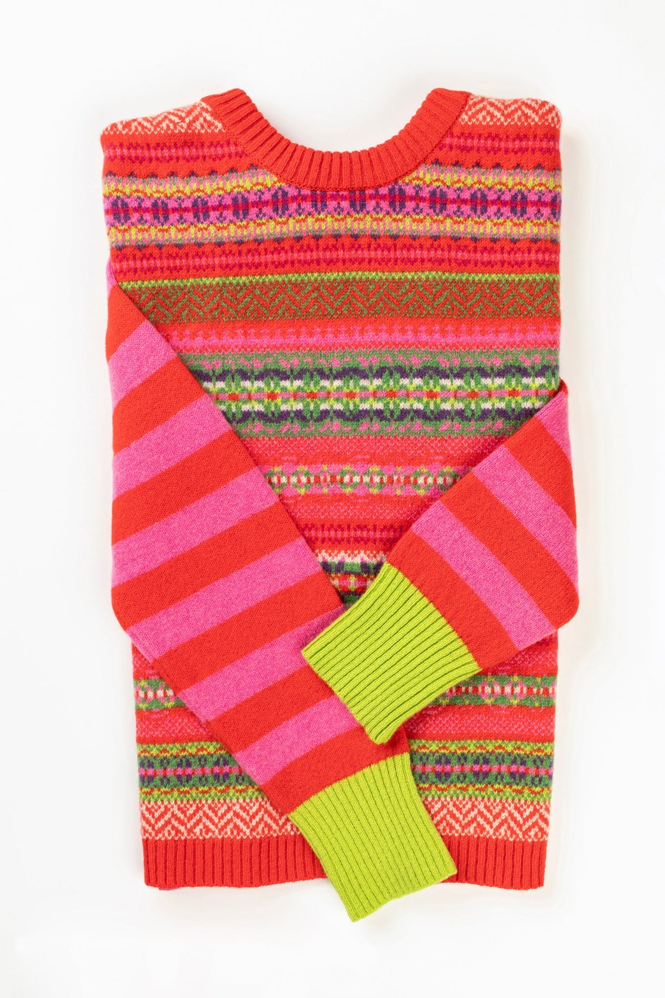 Eribe Stobo reversible fairisle and stripe sweater in soft lambswool, Rosa in pink and re with highlights of orange, lime and leaf green.