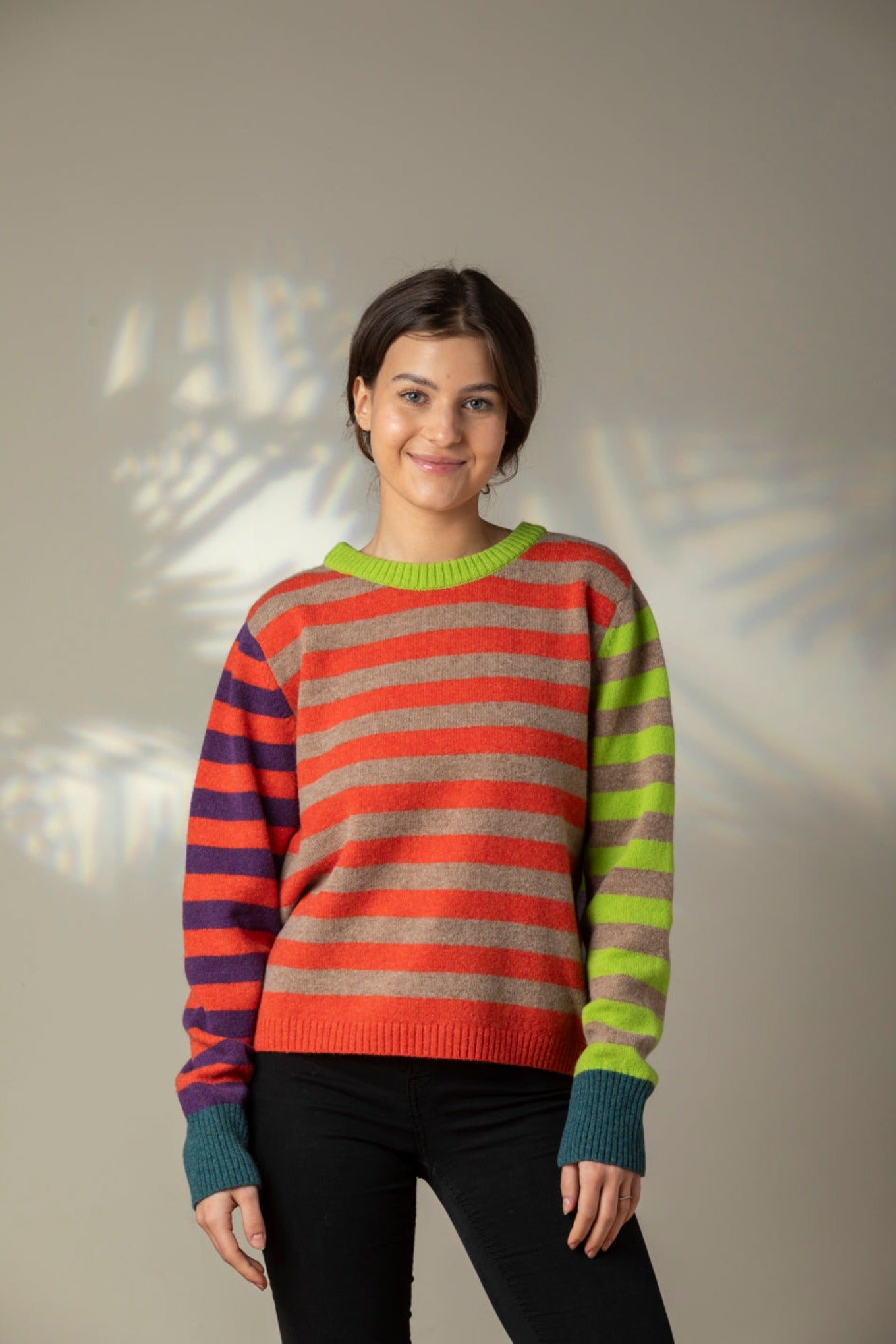 Eribe Stobo stripe reversible lambswool sweater in Luscious, lime and lavender and orange and purple and teal.