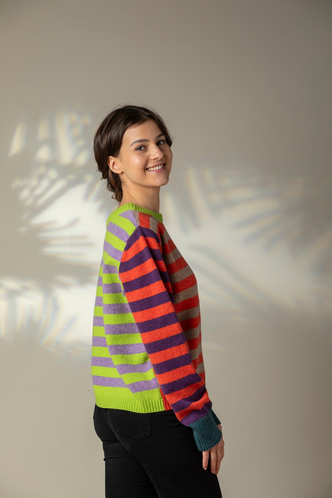 Eribe Stobo stripe reversible lambswool sweater in Luscious, lime and lavender and orange and purple and teal.