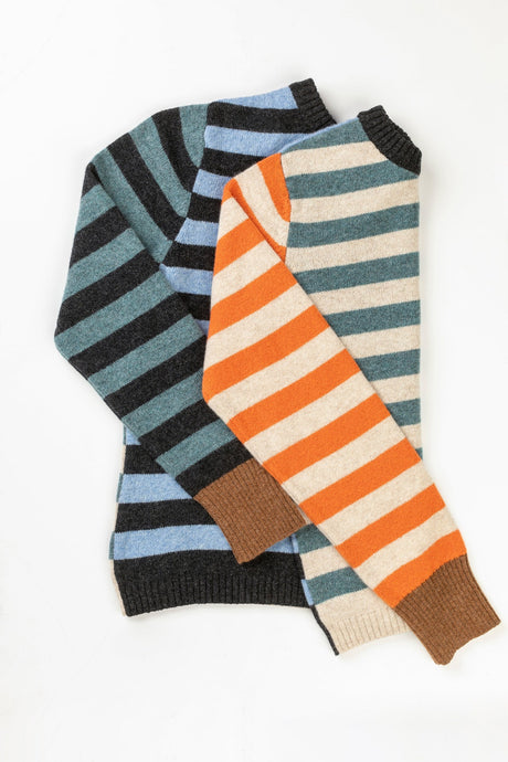 Eribe Stobo stripe reversible lambswool sweater in Phoebe, light blue and navy, cream and  terracotta and teal stripes.