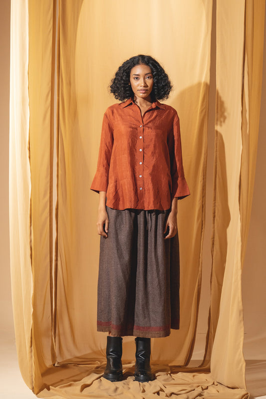 Dve Collection Arha silk button up blouse in rust.