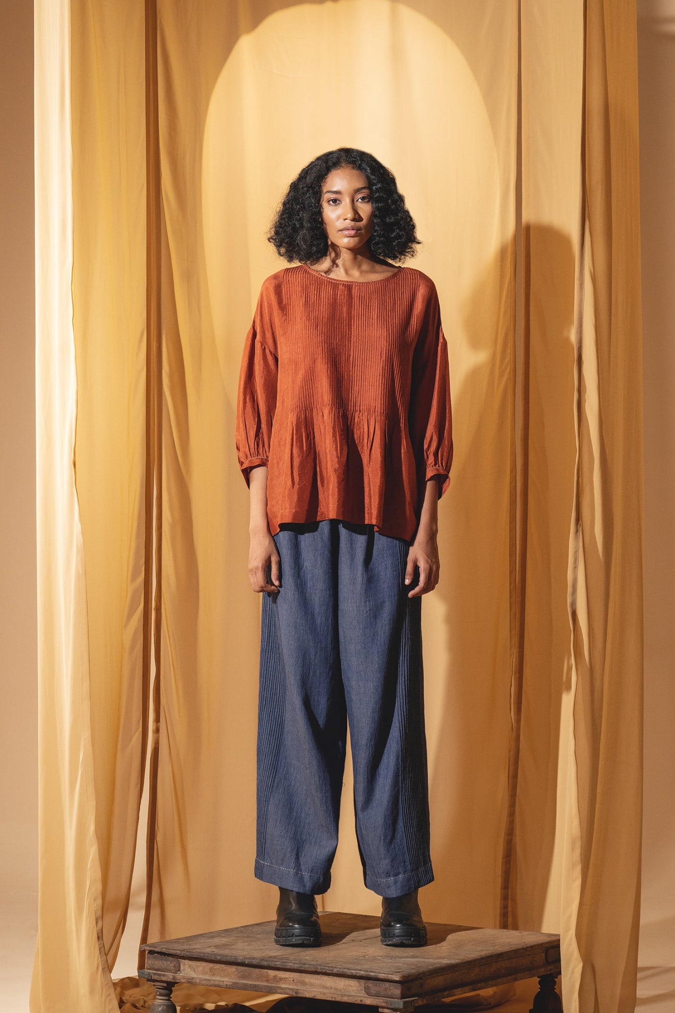 DVE Anisha pintuck top in rust silk.