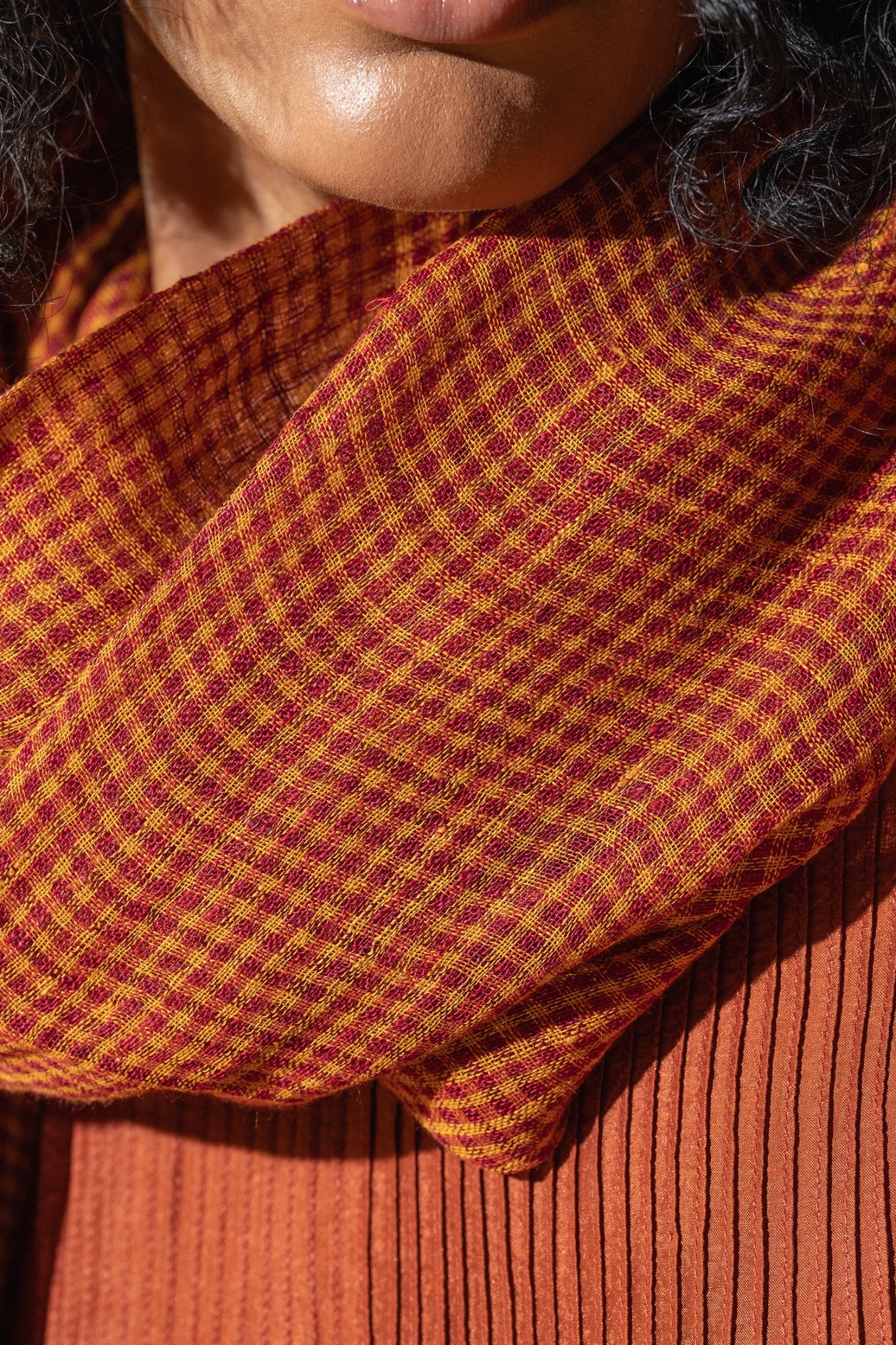 DVE rust gingham linen scarf.