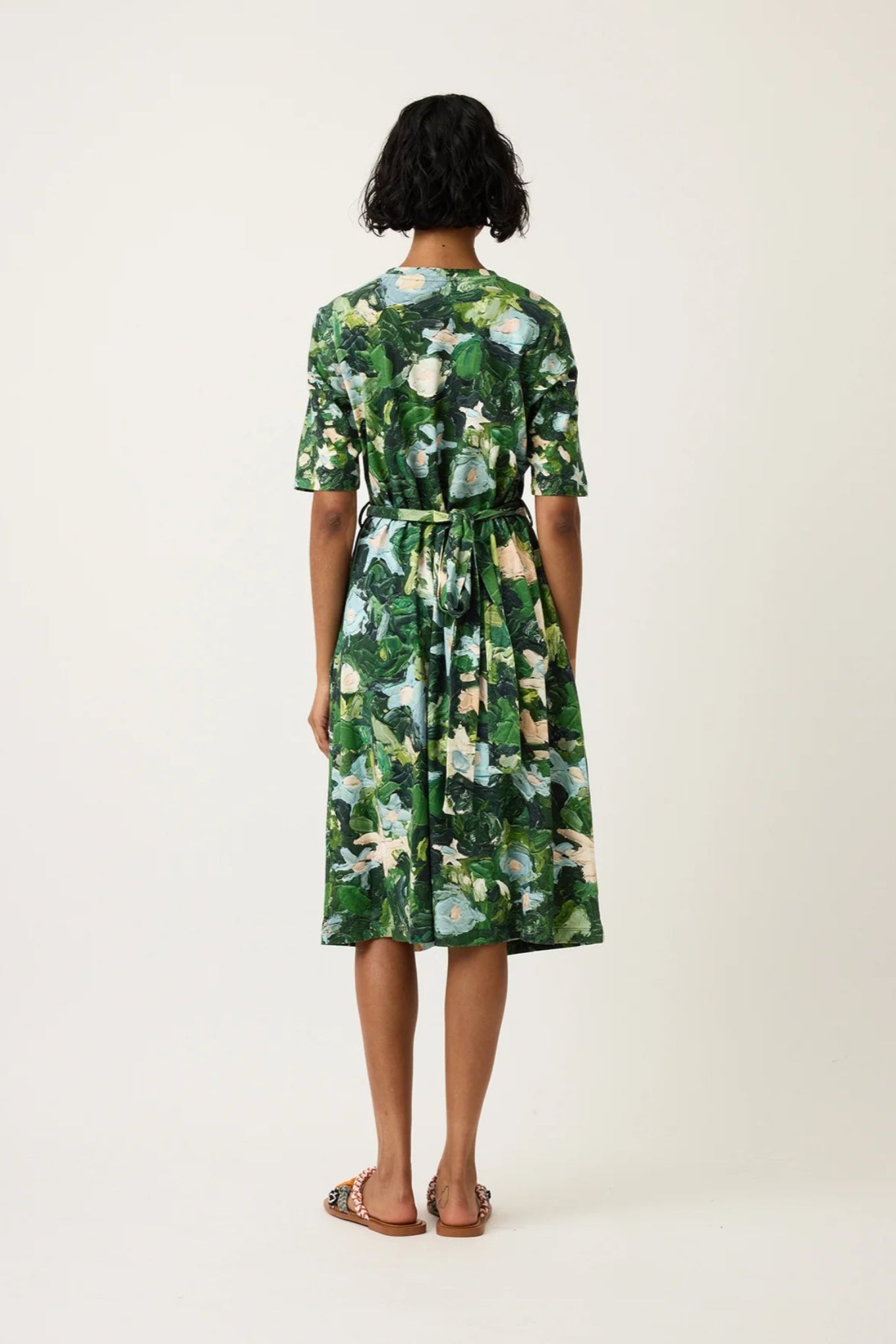Nancybird organic cotton short sleeve wrap Terra dress in green garden print.