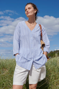 Noa Noa Mire shirt in cotton seersucker, V neck long sleeve button up on blue and white stripe.