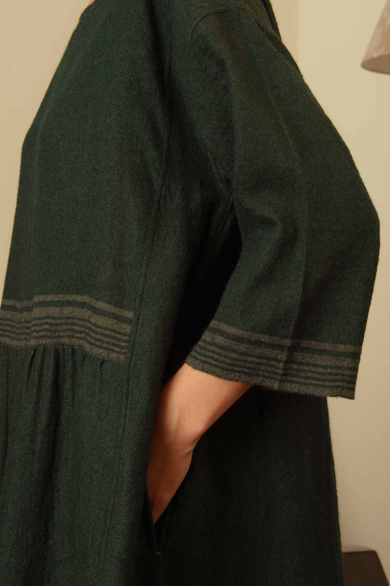 DVE Collection classic Padma dress in soft wool forest green.