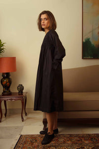 DVE Collection Tanisi long sleeved smocked dress in black paper cotton.