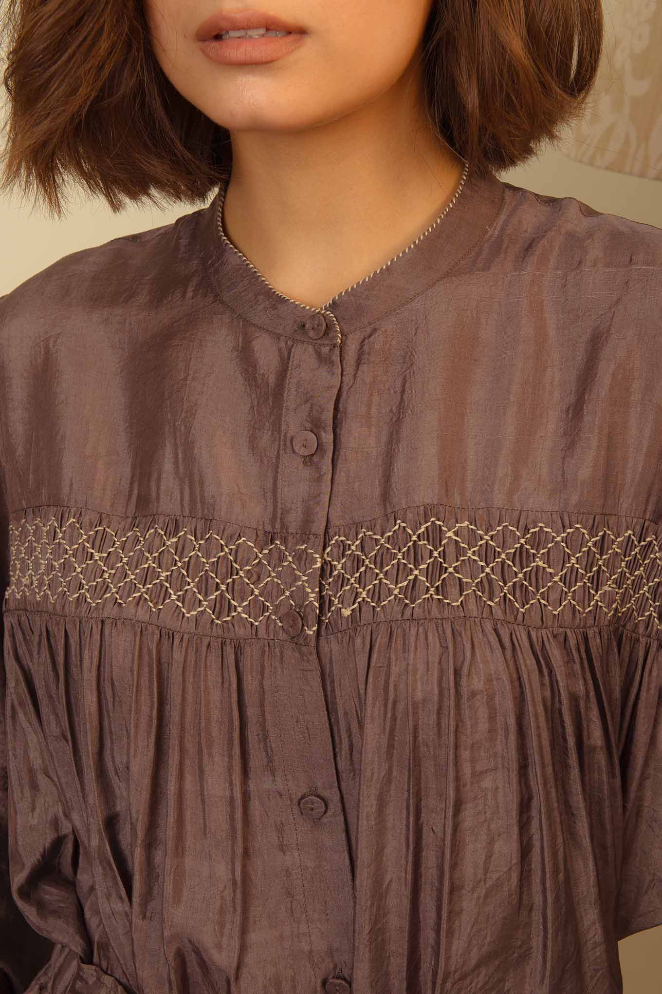 DVE Usha blouse in handloom grey silk with smocked front.