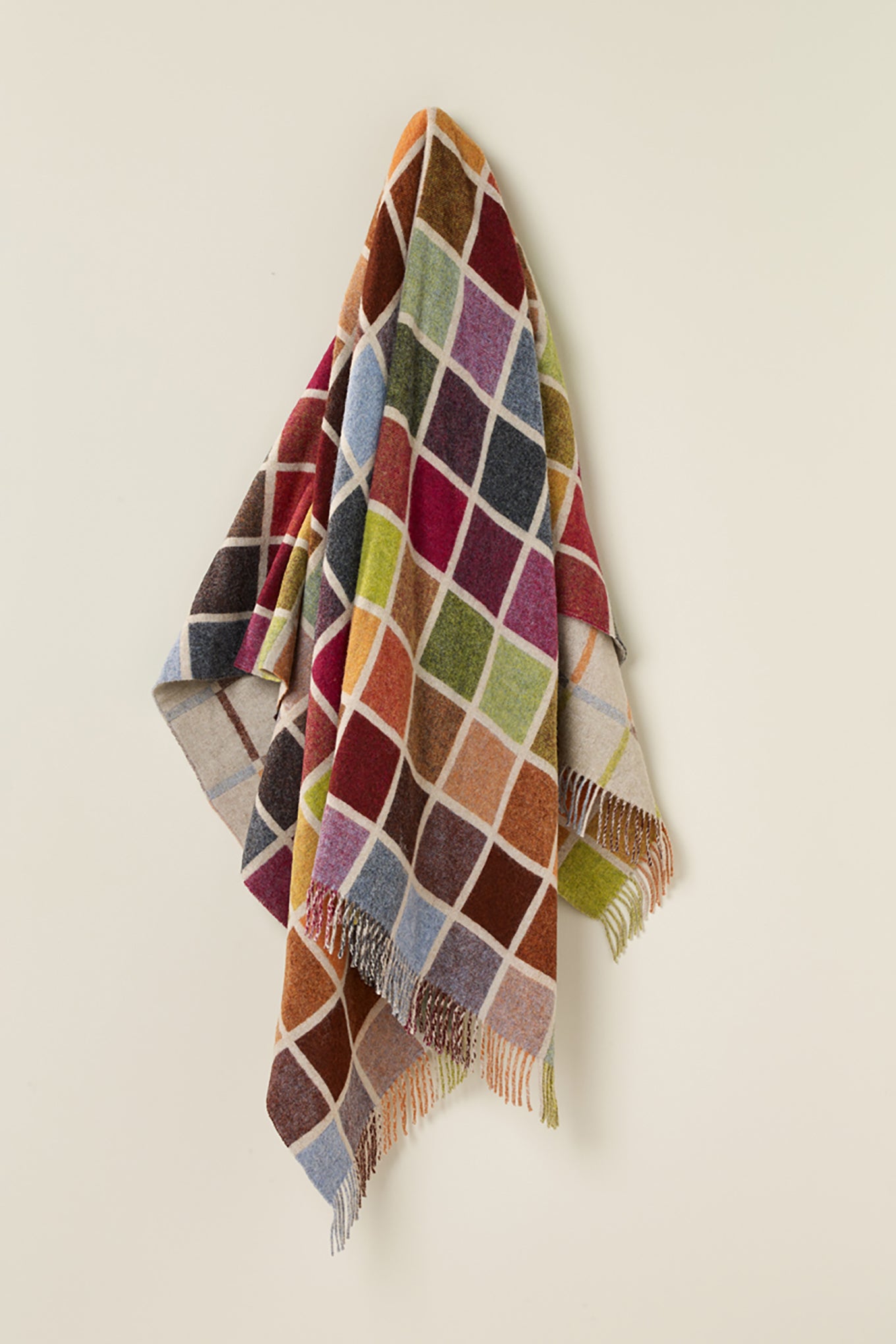 Bronte by Moon multi colour Block throw on beige, pure wool.