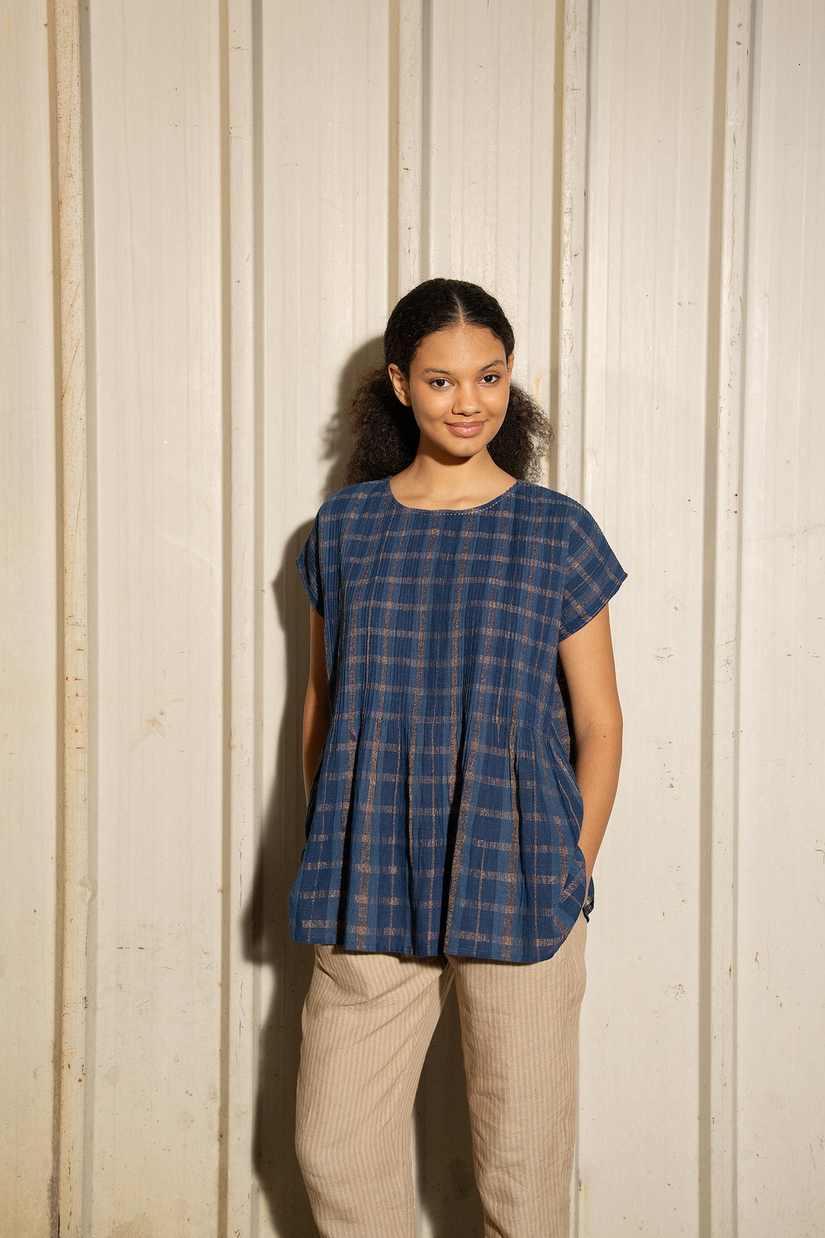 DVE Divya pintucked top in checked handloom indigo check cotton with lurex stripe.