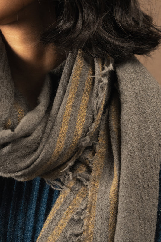 DVE Fine wool scarf in gunmetal grey with mustard and blue selvedge.