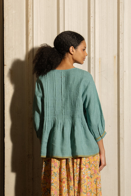 Dve Soma handloom linen pintuck 3/4 sleeve blouse in mineral green.