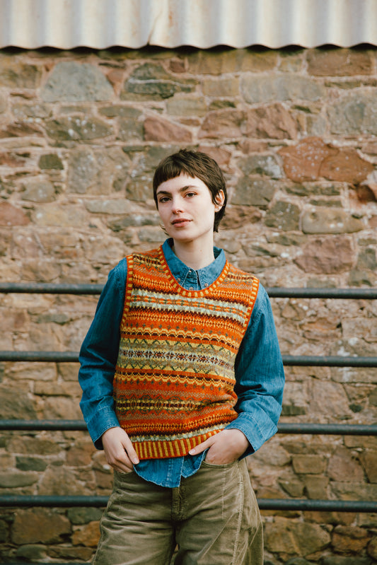 Eribe Shetland wool Westray fairisle vest in orange, taupe and soft yellow.