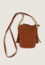 Load image into Gallery viewer, Nancybird Form pouch leather phone bag in pumpkin tan with beads and tassel detail.