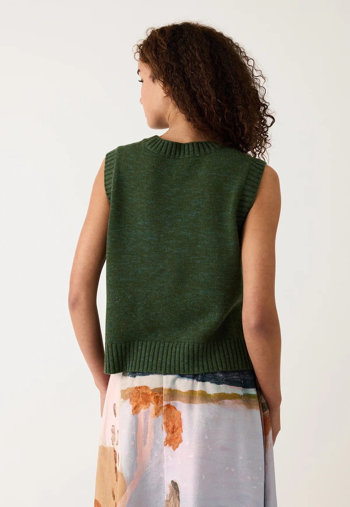 Nancybird cypress green cable knit merino wool vest.