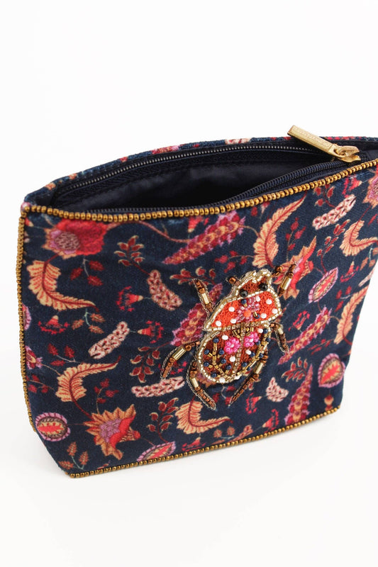 My Doris Autumn beetle handbeaded small zippered pouch.