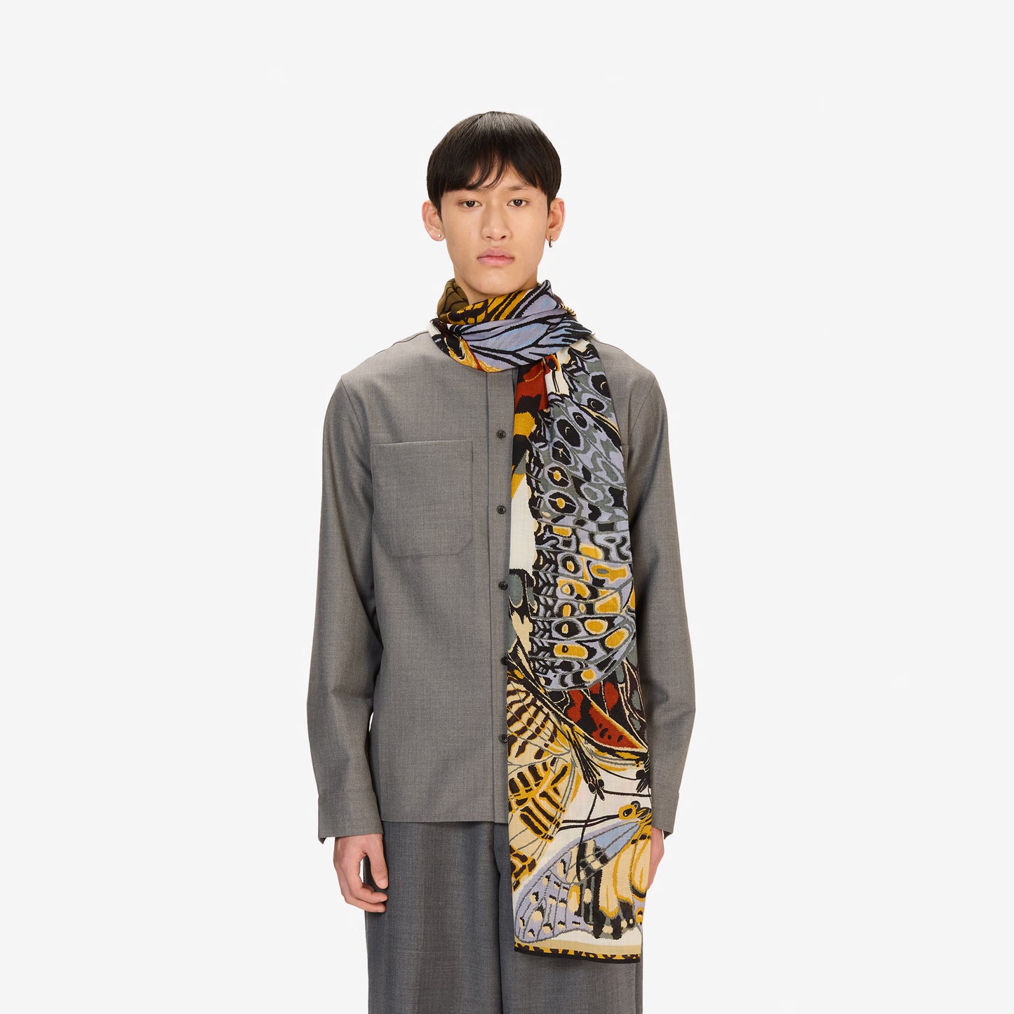 Inoui Editions fine wool scarf Papillons featuring colorful butterfly illustrations on a white background.