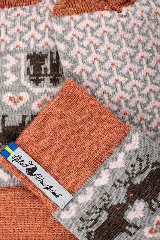 Ojbro Vantfabrik made in Sweden merino wool sooks in Fasfolk couples design in orange and grey.