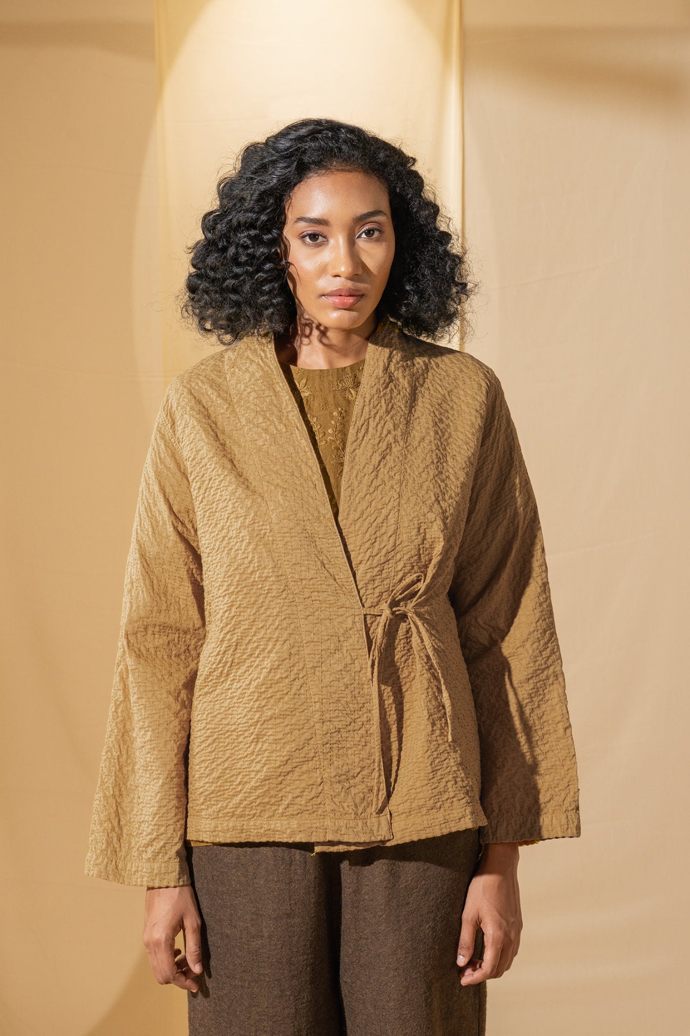 Dve hand quilted cotton Neha jacket in deep mustard.