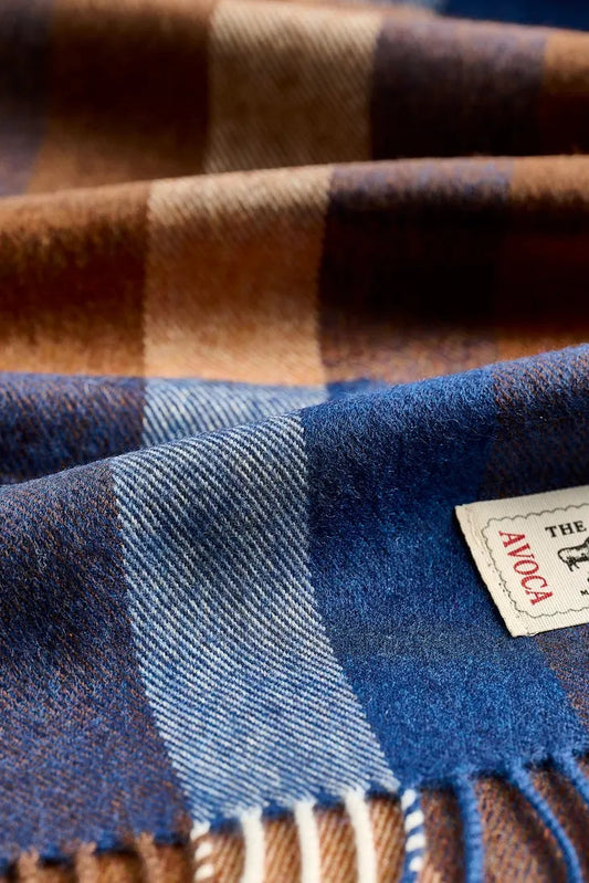 Avoca Grieg merino wool plaid scarf with blue and brown pattern.