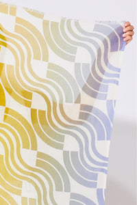 Ma Poesie Module scarf screen printed on organic cotton, in shades of yellow and orange.