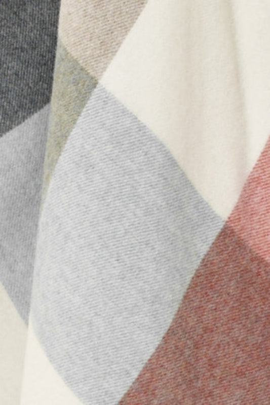 Bronte by Moon soft merino wool throw in large check Block Islay pattern in orange.