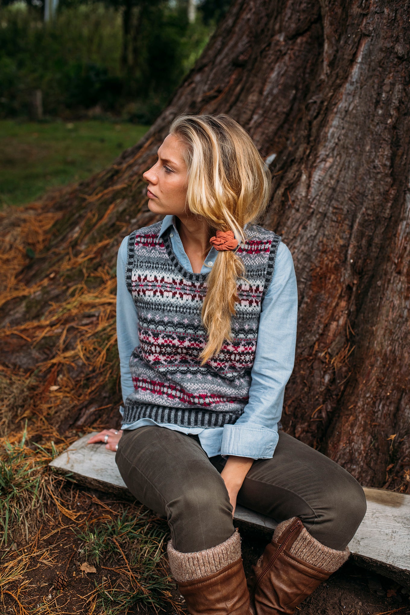 Eribe Westray Shetland wool fairisle vest in Tokyo, shades of grey with magenta, burgundy and pink.