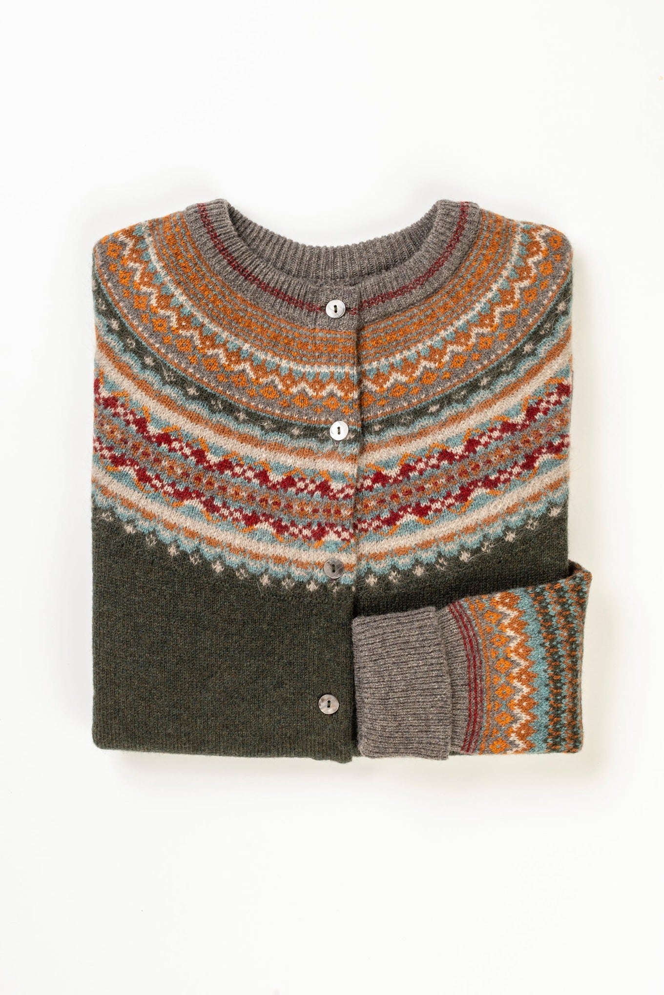 Eribé Scottish fairisle cardigan merino wool in Bracken, deep olive green iwth accents in mustard, brown grey, aqua and brick red.