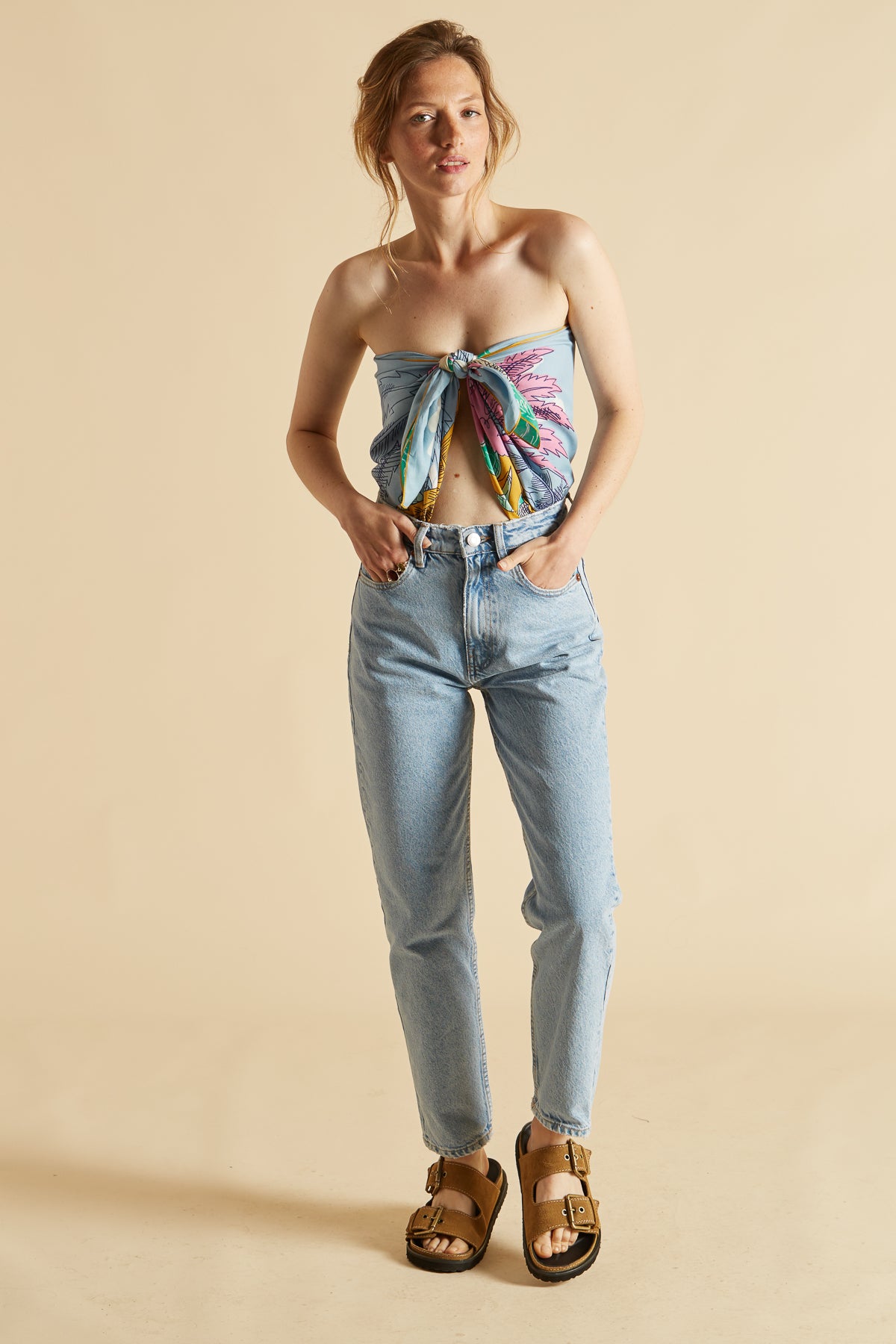 Inoui Editions silk cotton carre scarf, Robinson tropical island trees in pink and mustard on pale blue and mint green background.