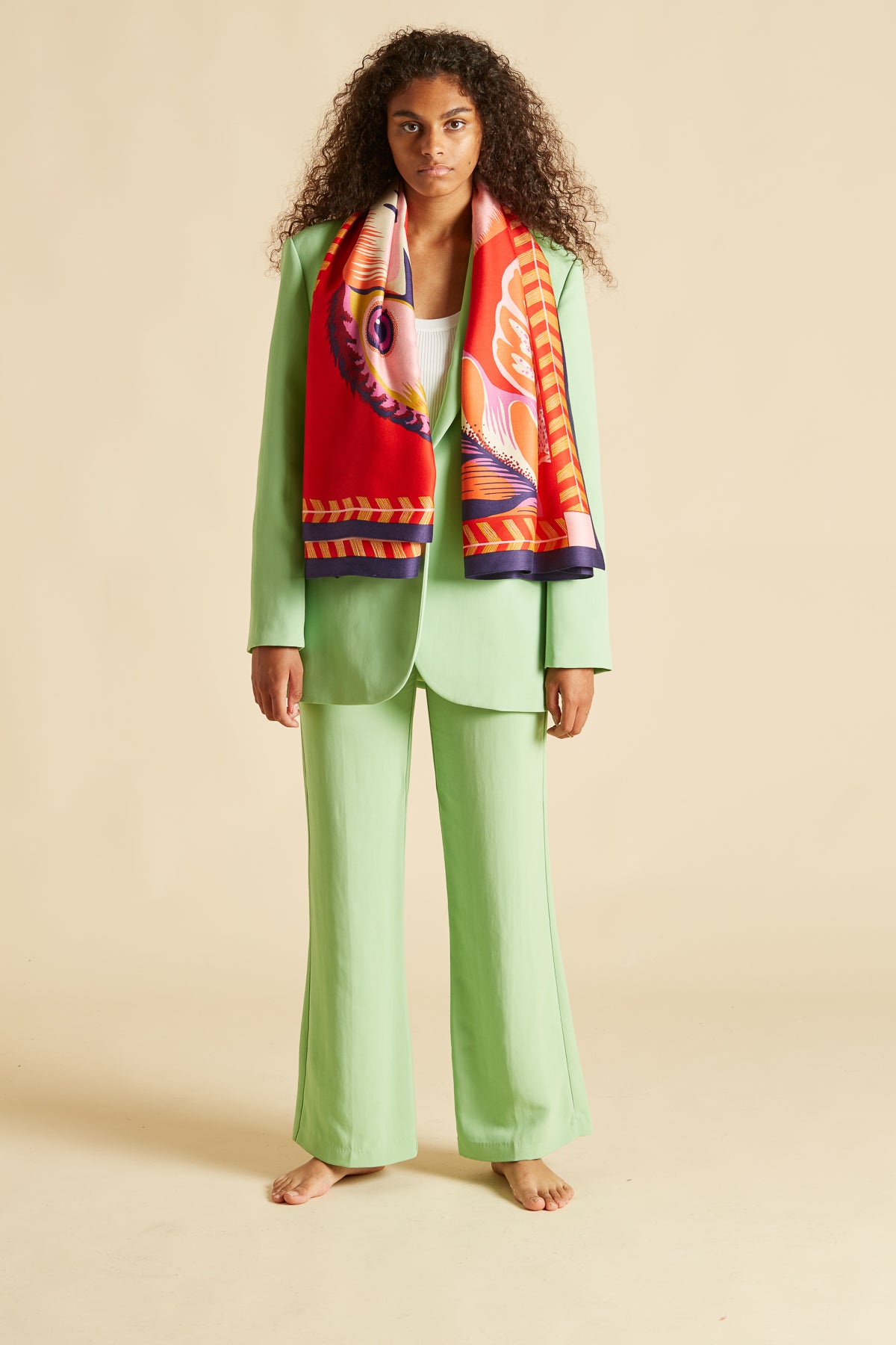 Inoui editions silk modal carre scarf Toucan, featuringpair of toucans on a vibrant vermilion red.