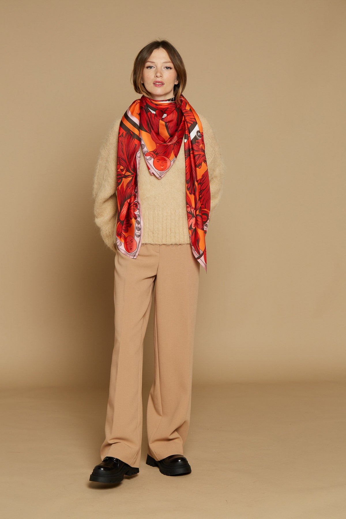 Inoui Editions large square scarf, clock design Horlorge in orange and vermilion, black and white.