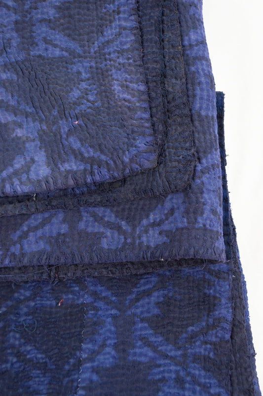 Vintage kantha quilt overdyed in dark double indigo mud resist blockprint, abstract floral.
