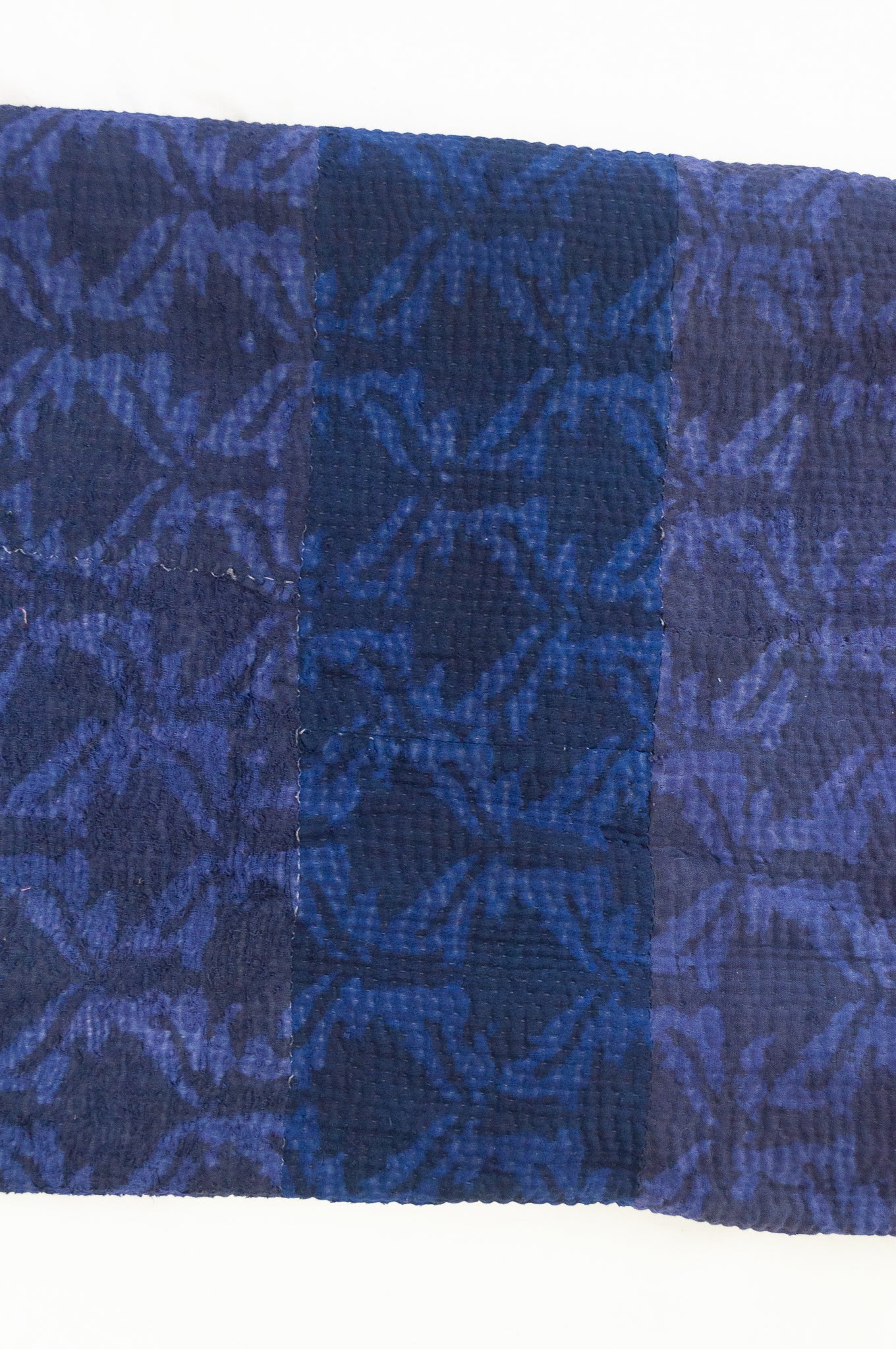 Vintage kantha quilt overdyed in dark double indigo mud resist blockprint, abstract floral.
