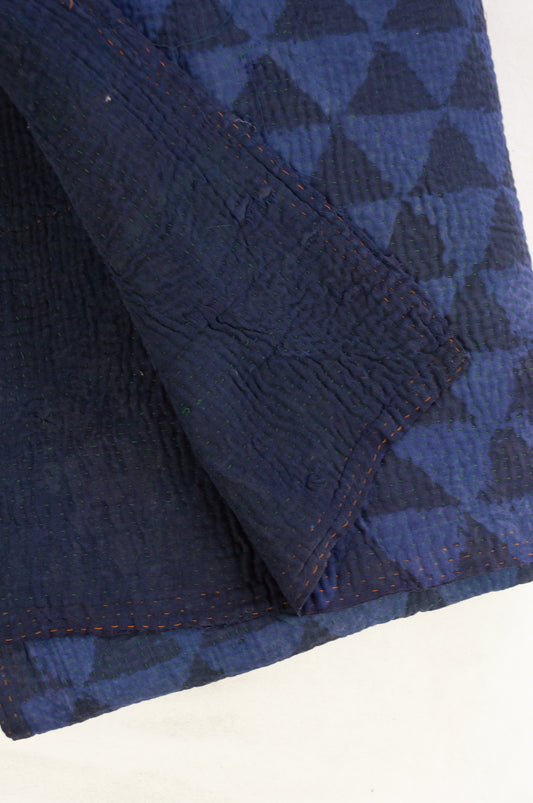 VIntage kantha quilt, overdyed in natural indigo using mud resist blockprint, triangle pattern.