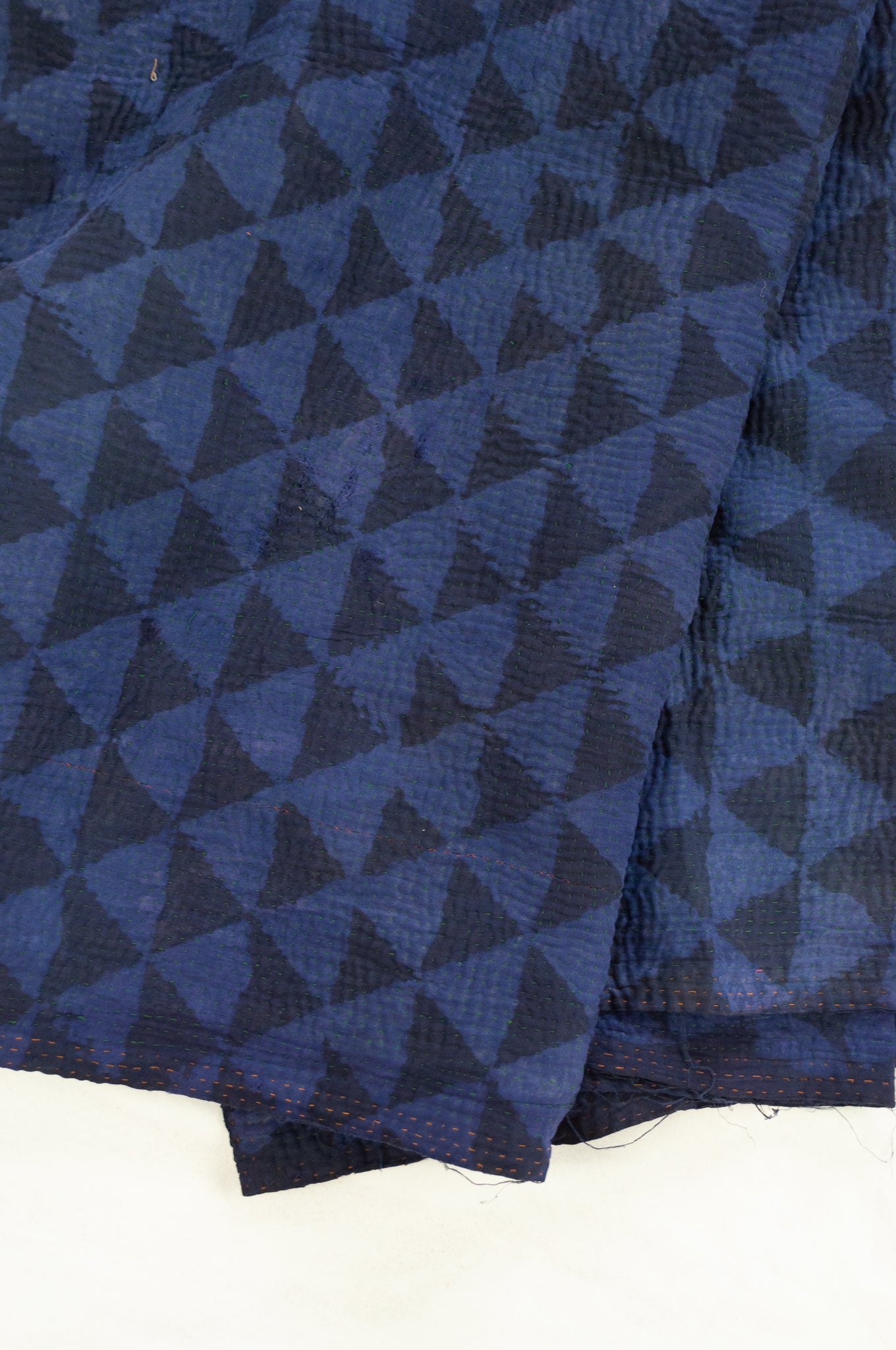VIntage kantha quilt, overdyed in natural indigo using mud resist blockprint, triangle pattern.