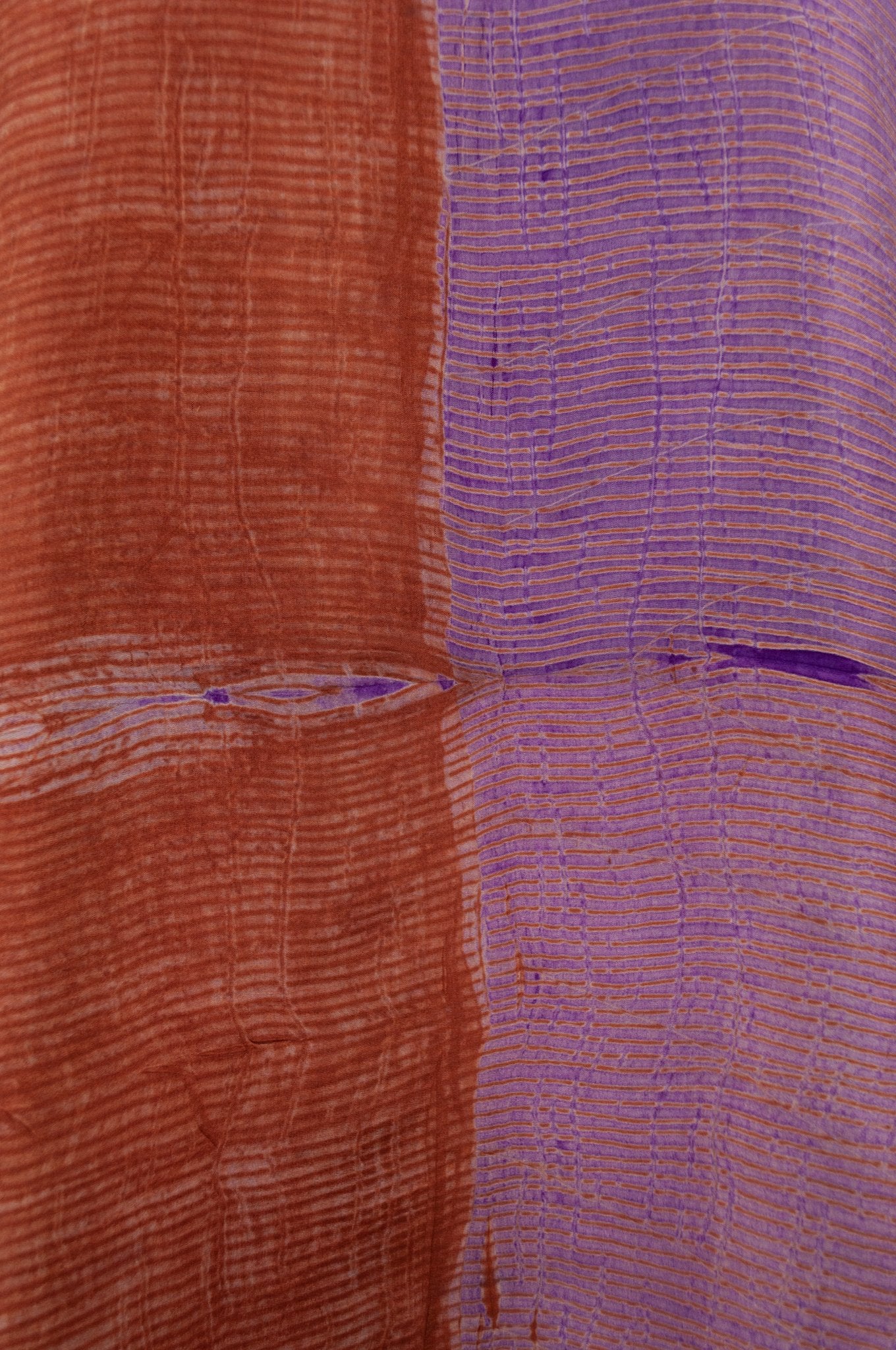 Pure silk shibori dyed silk kurta top in copper and lilac, fabric detail.