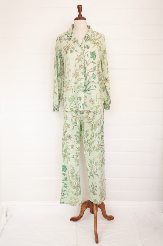 Juniper Hearth ethically made cotton voile full length pyjamas, beautiful vanilla, light turquoise and taupe floral print on soft celadon green background.