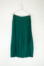 Load image into Gallery viewer, Valia made in Australia merino wool jersey knit Tulip skirt in myrtle green.