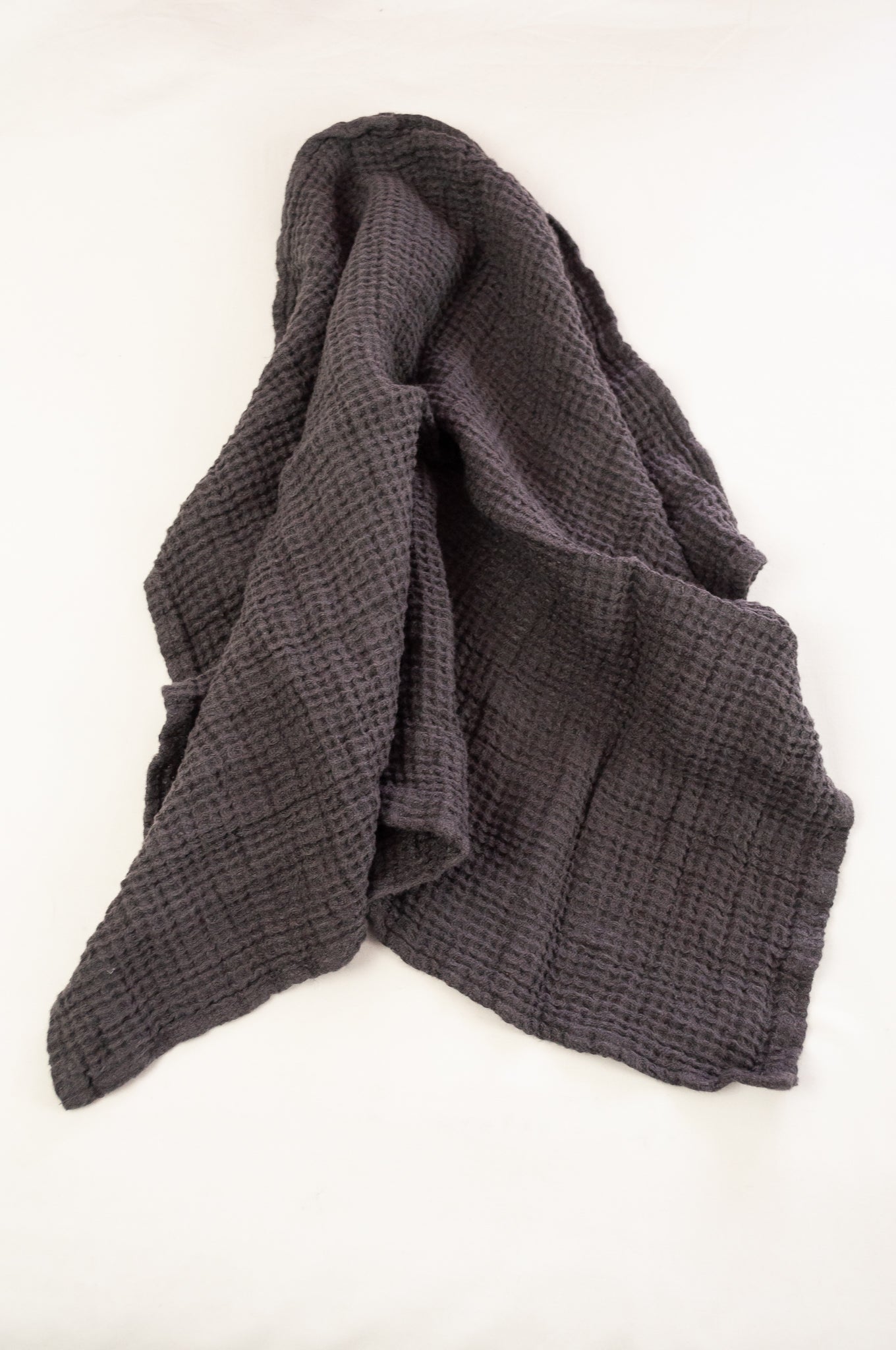Waffle weave pure linen hand towel, made in Lithuania. In charcoal grey.