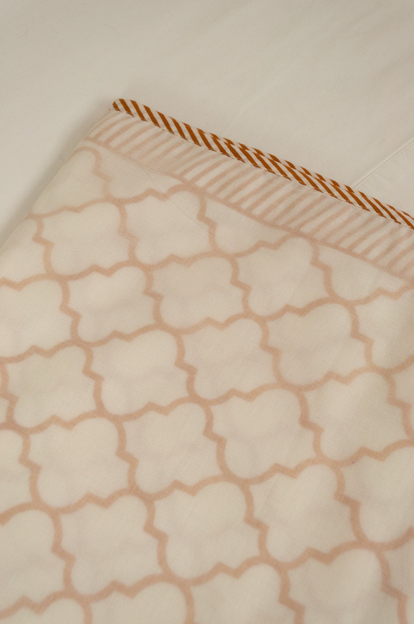Soft cotton muslin layered dohar Queen King size bed quilt blankets, mustard tile pattern with stripe border.