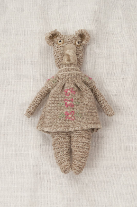 Sophie Digard crochet teddy bear, Pippa - oatmeal wool with matching dress featuring rose pink flowers.