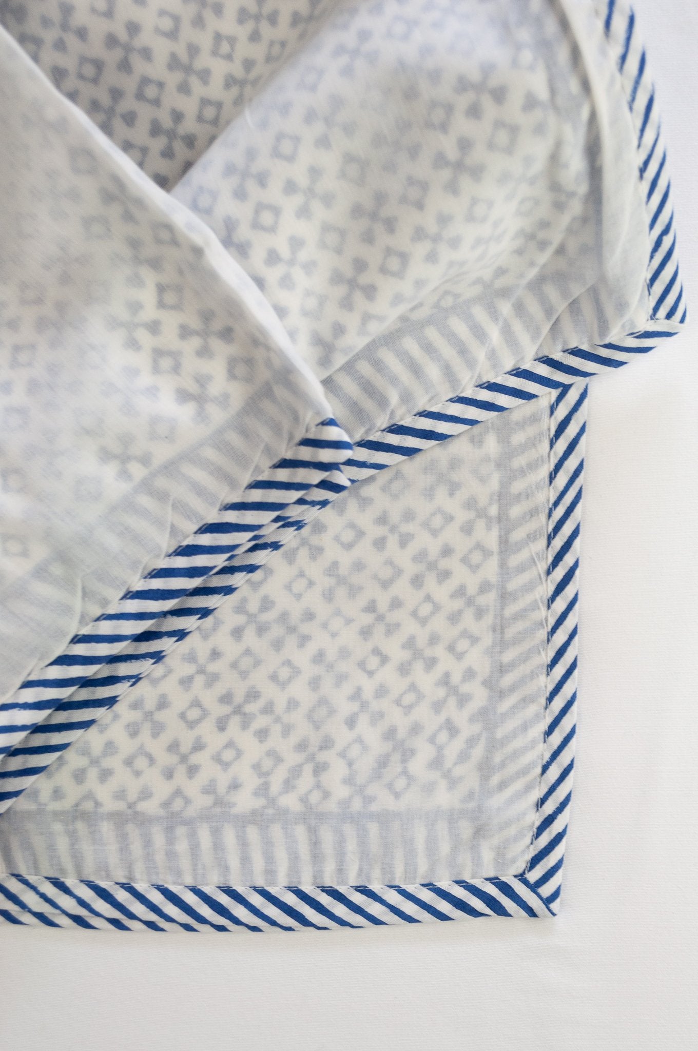 Indigo blue and white geometric jumping jack block print blockprint dohar lightweight muslin bedcover.