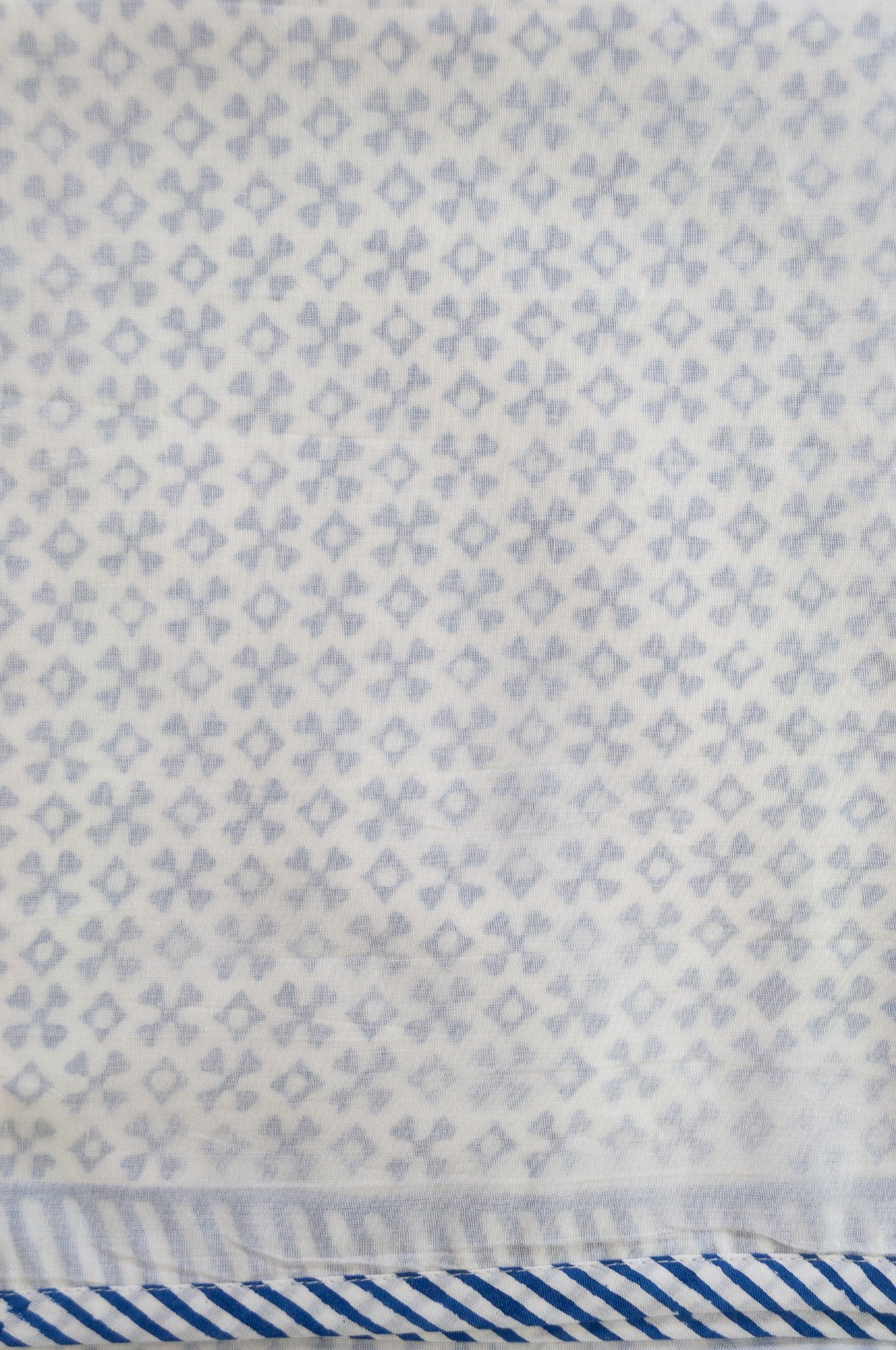 Indigo blue and white geometric jumping jack block print blockprint dohar lightweight muslin bedcover.