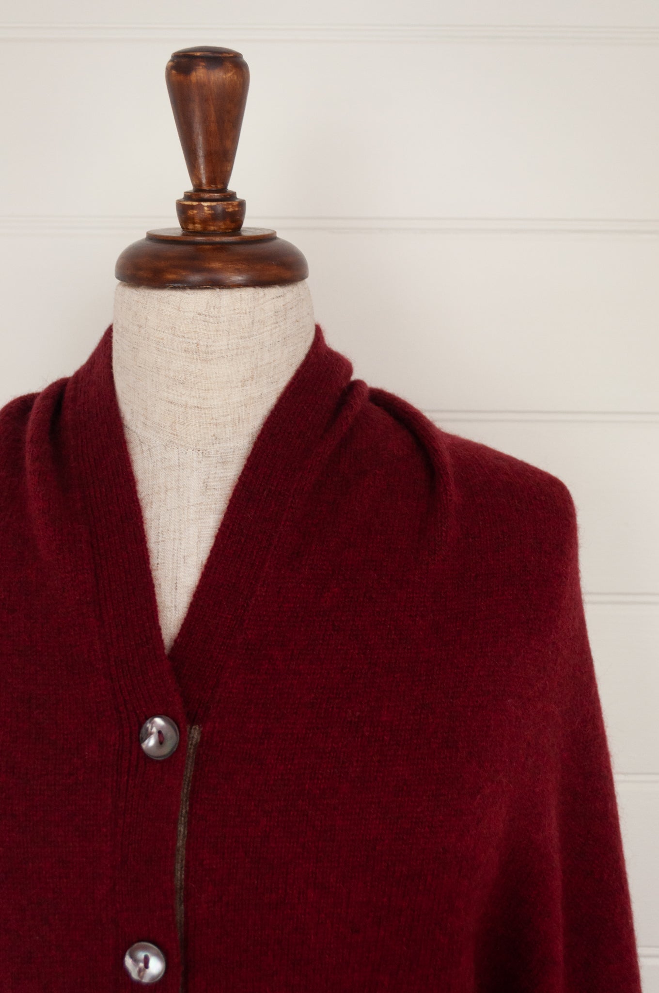 Juniper Hearth baby yak poncho in Cherry Red.